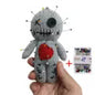 Voodoo doll with pins