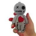 Voodoo doll with pins